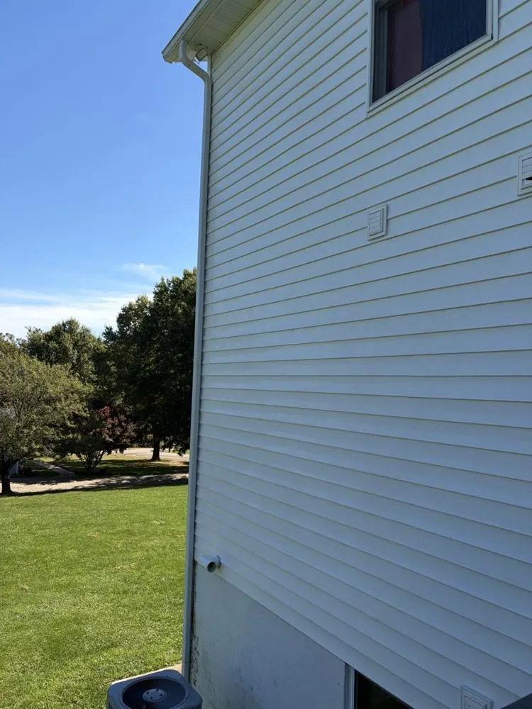 After: bright white siding after soft wash