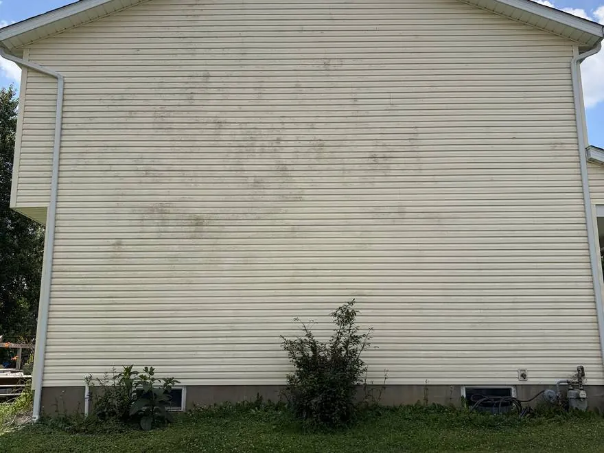 Before: dirty siding