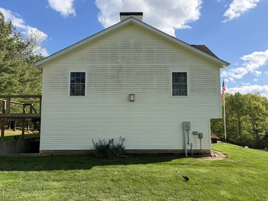 Before: dirty siding