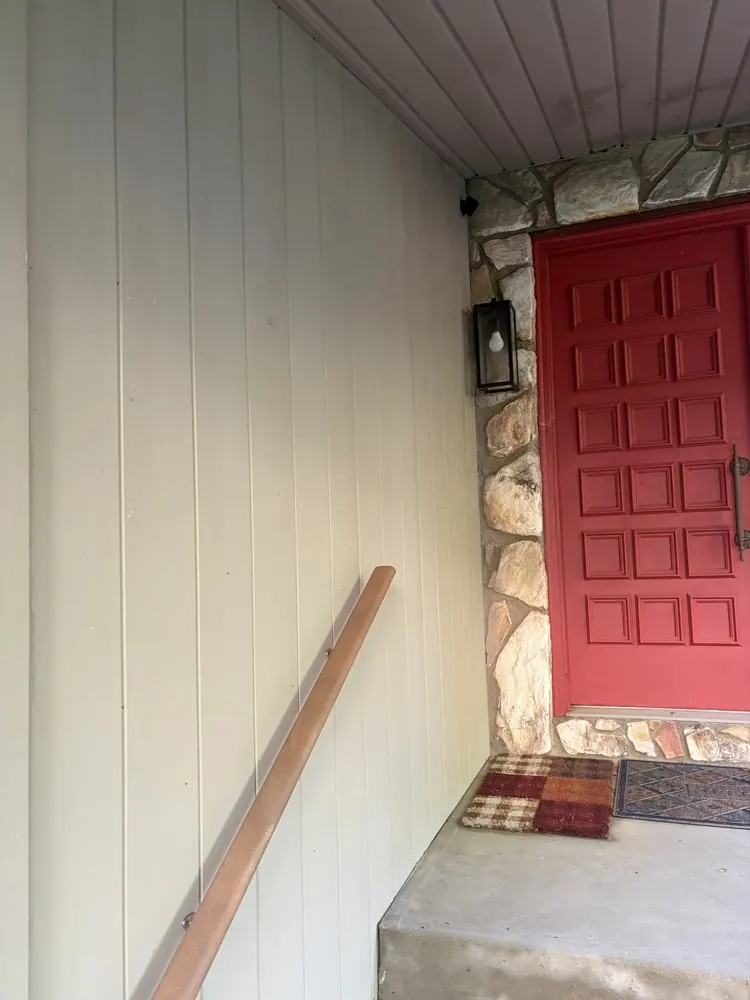 After: wood siding at the front entry clean