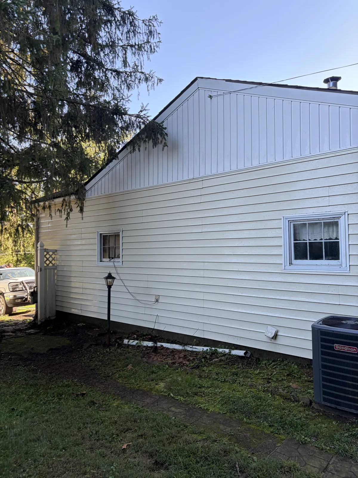 After: siding and gable clean after soft wash