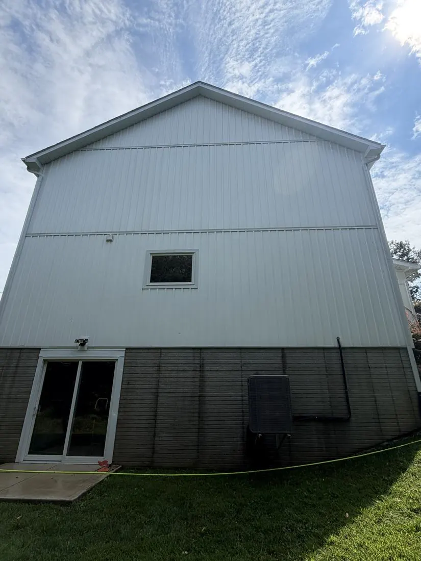 After: tall vertical siding clean after soft wash