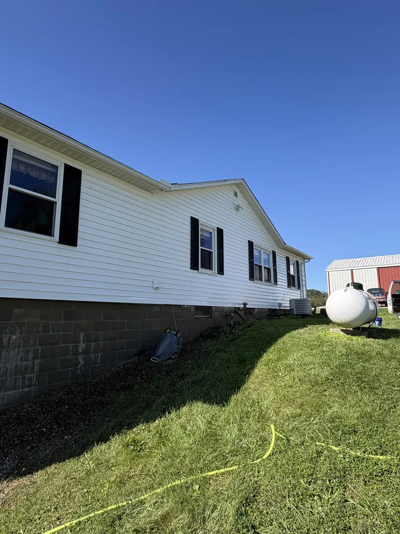 After: bright white siding after soft wash